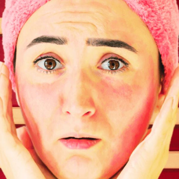 Woman with irritated skin in infrared sauna, illustrating eczema symptoms and heat sensitivity