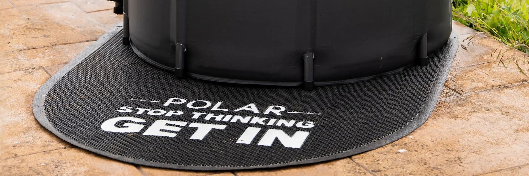 A protective mat under a cold plunge tub improves safety, protects flooring, and helps stabilise the setup.