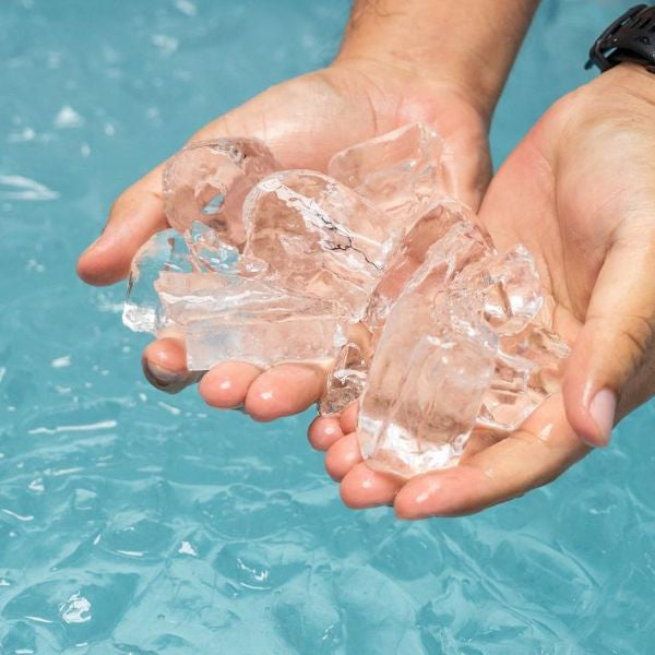 Outdoor spa setup featuring a modern cold plunge tub used for ice baths
