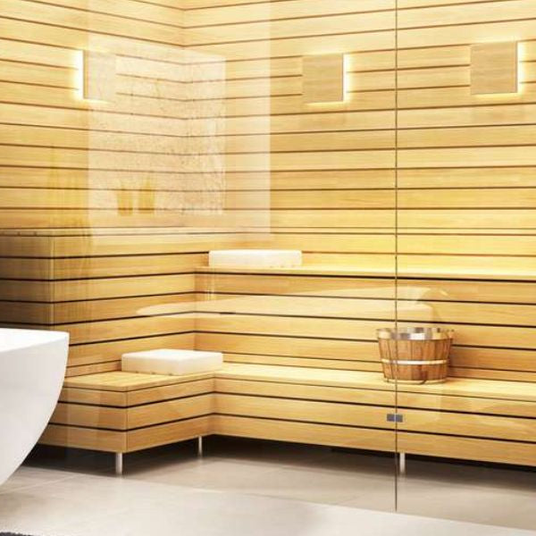 Luxury bathroom with built-in sauna and walk-in shower, showing premium home spa setup