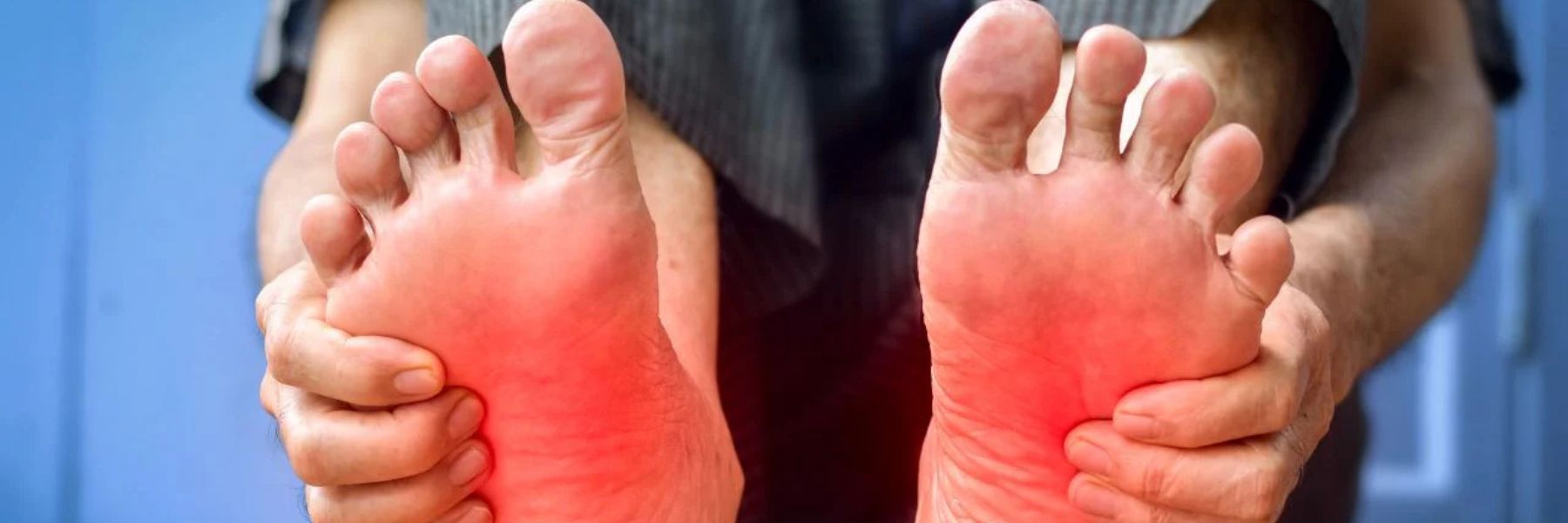 Close-up of inflamed feet showing nerve pain symptoms linked to neuropathy and poor circulation