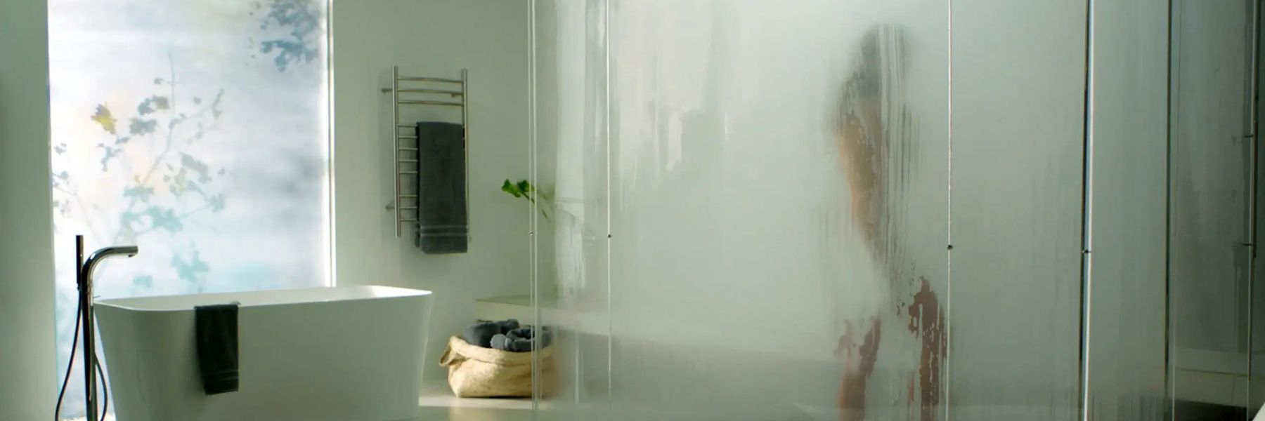 Modern steam shower with frosted glass and warm steam helping relieve cold and congestion symptoms
