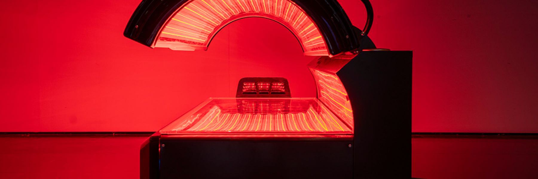 Professional red light therapy bed, illustrating ideal treatment frequency and session timing for best results