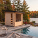 Dundalk CT Avalon cedar cabin sauna beside a pool in autumn