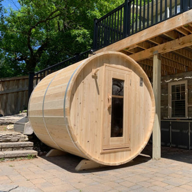 The assembly of Dundalk CT Harmony Wood Burning Barrel Sauna.