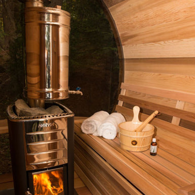 This stainless steel water tank holds 30 liters (7.5 gallons) of water and will only mount on the chimney going straight up in the sauna