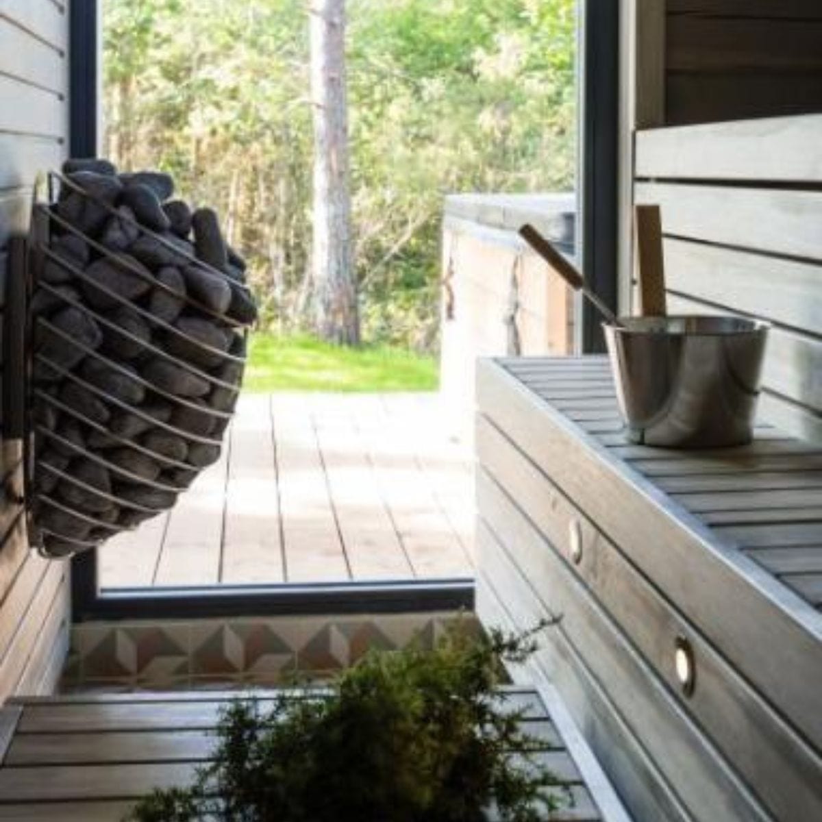 The organic and minimalist design of the DROP heater makes it the statement piece of your sauna