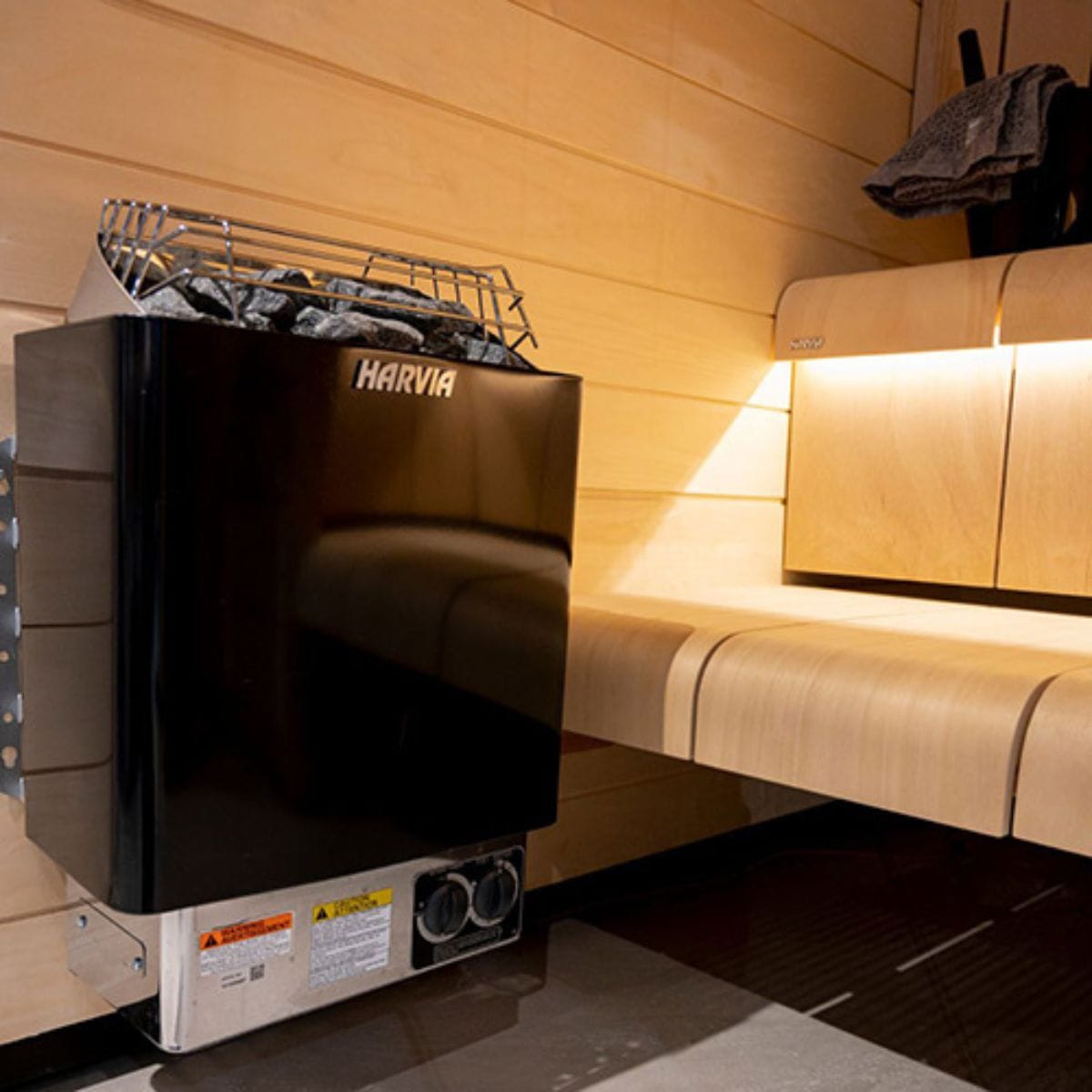 The unit includes a black steel exterior, industrial-strength heating elements, a built-in control panel, and several other innovative features