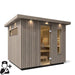 Exterior lighting surrounds the sauna, creating a warm atmosphere