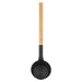 Black ladle with a wooden handle on a white background