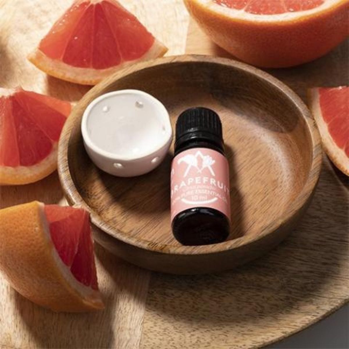 This Saunum Aroma Oil Set includes a 10 mL bottle of grapefruit