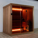 Dundalk CT Element Studio indoor sauna, three-quarter view with the full-glass front lit