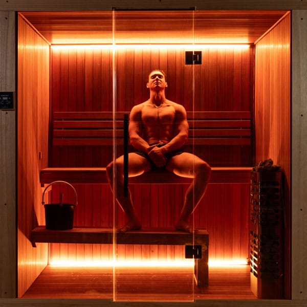 Bather sitting on the upper bench of the CT Element Studio